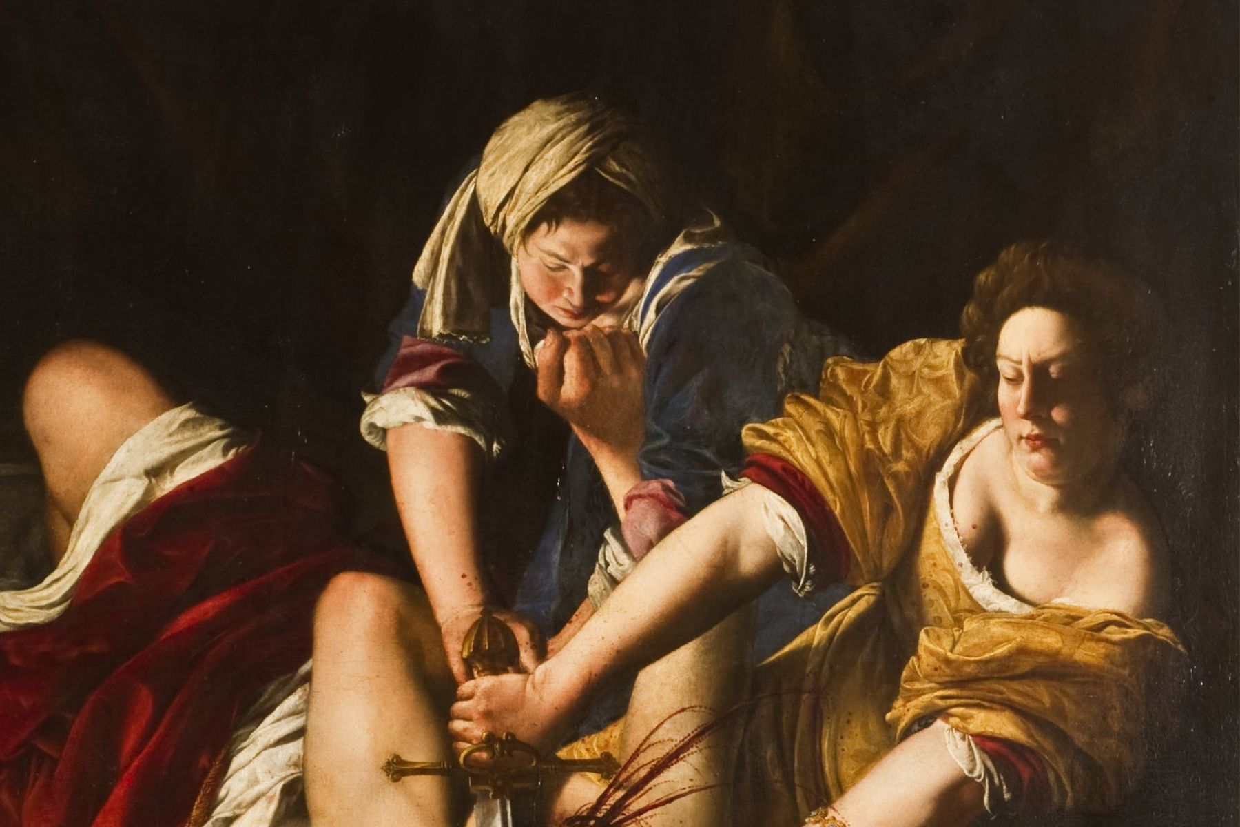 Cropped detail of Artemisia Gentileschi’s Judith Beheading Holofernes, showing Judith in the act of slaying Holofernes