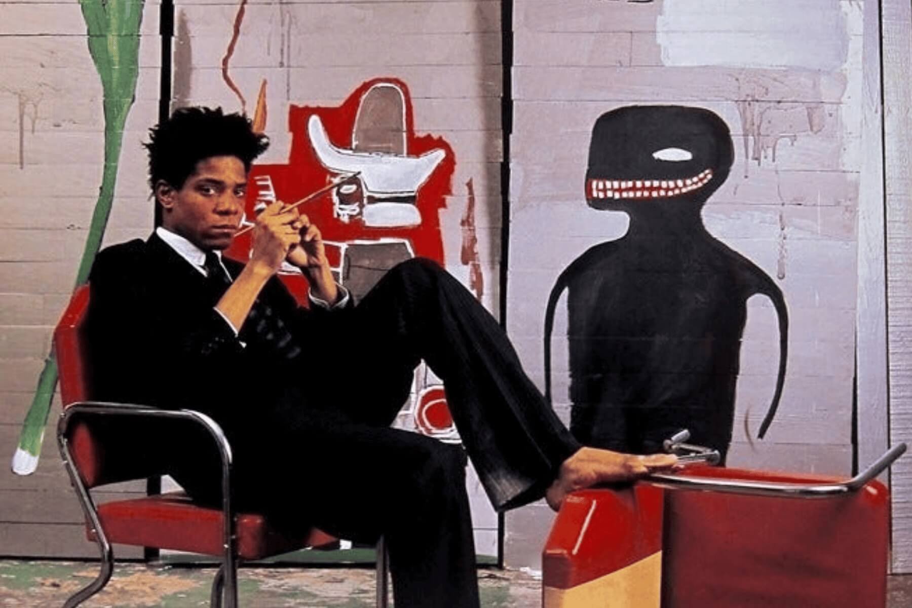 basquiat-portrait-1985-nytimes-mag-the-lawless-muse Jean-Michel Basquiat wearing a suit, gazing directly at camera with expressive eyes