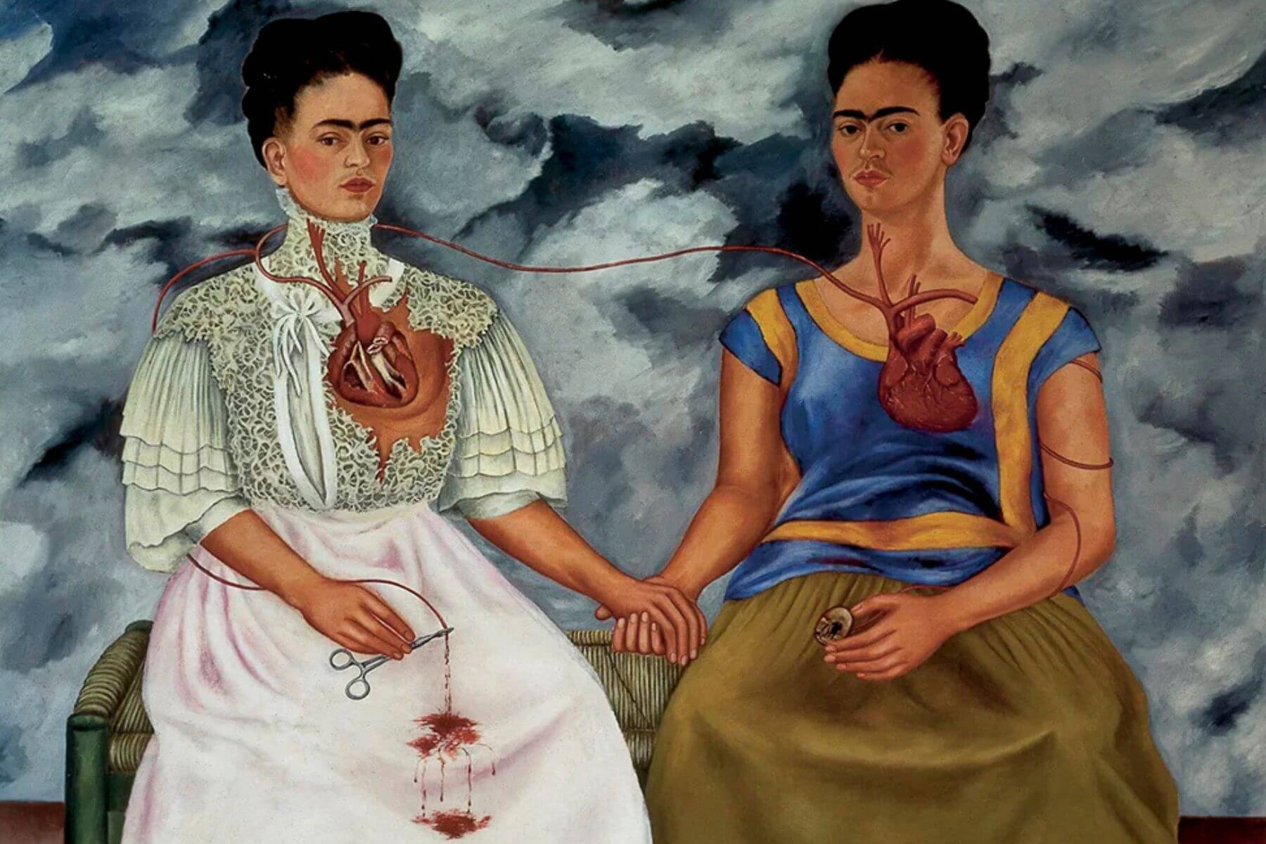 Frida Kahlo’s painting The Two Fridas showing two seated self-portraits connected by a shared vein
