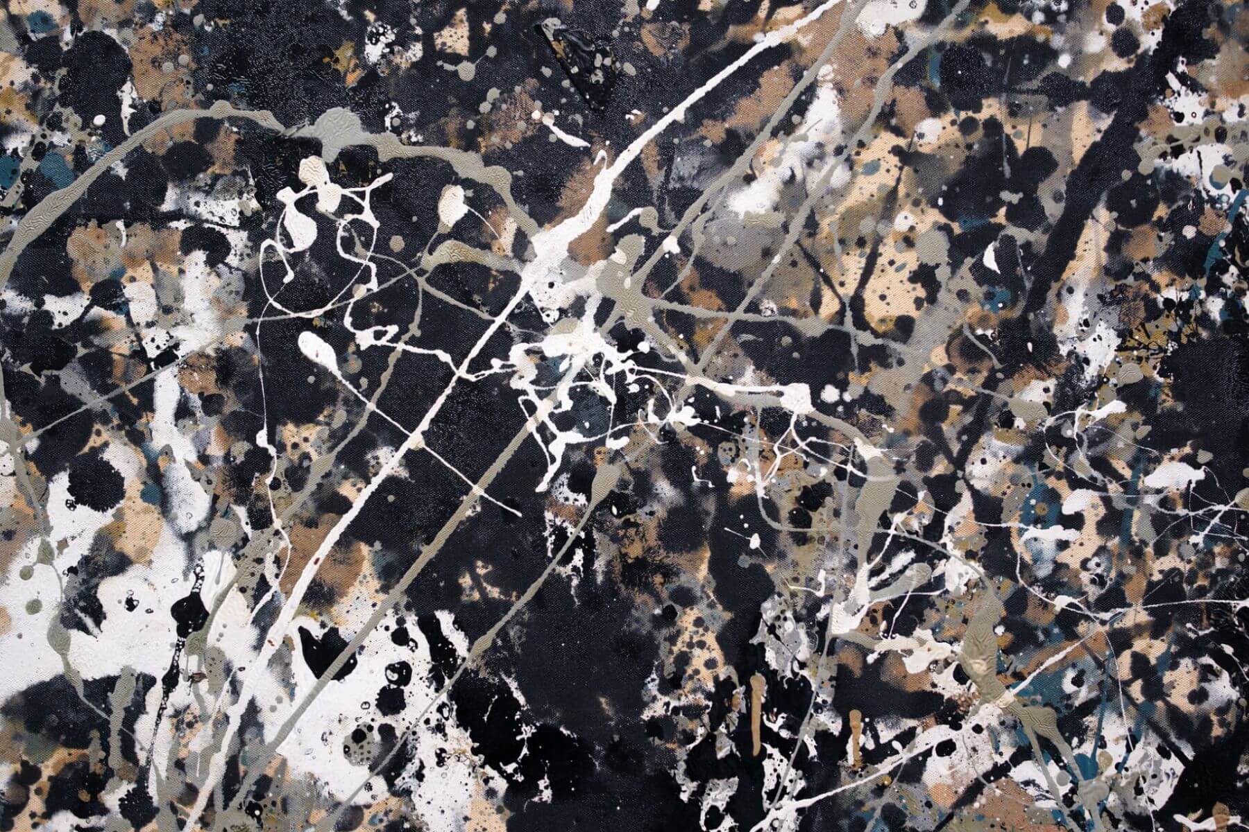 pollock-one-number-31-detail-1950-the-lawless-muse Detail view of Jackson Pollock’s One: Number 31 with black, white, and tan paint splatters and linear drips