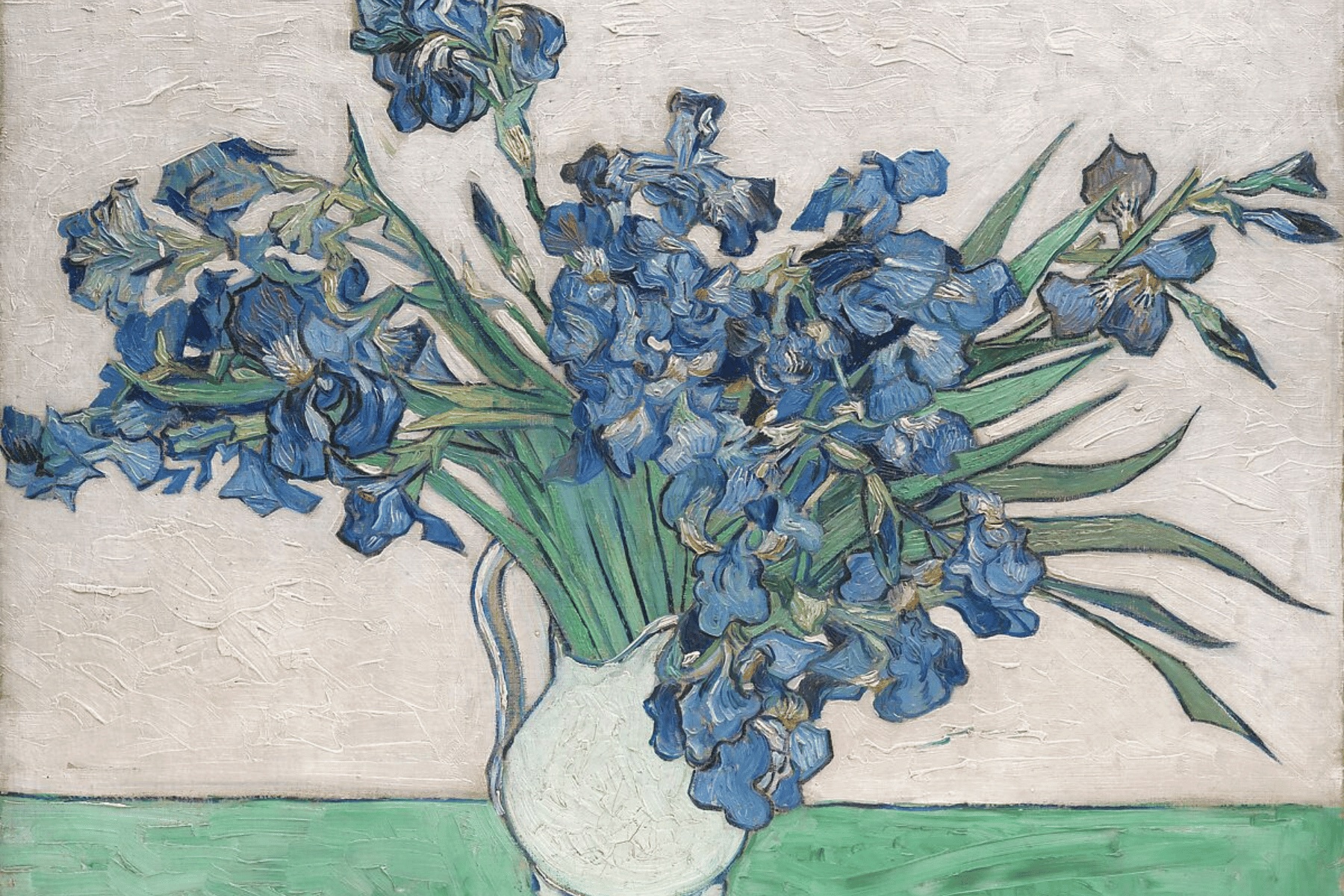 Vincent van Gogh’s painting of blooming purple irises with green leaves against a light background