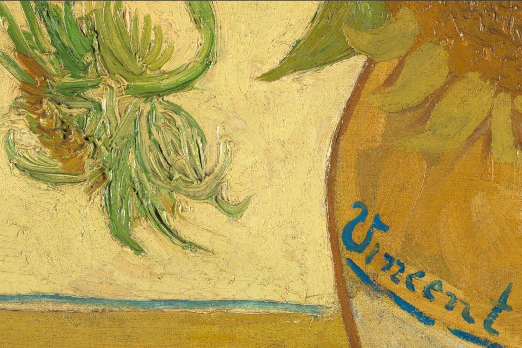 Close-up of a sunflower and Vincent van Gogh’s signature on the canvas
